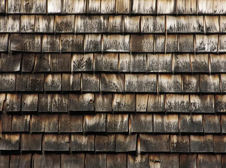 Pattern of cedar shingles on old Cape Cod building-1